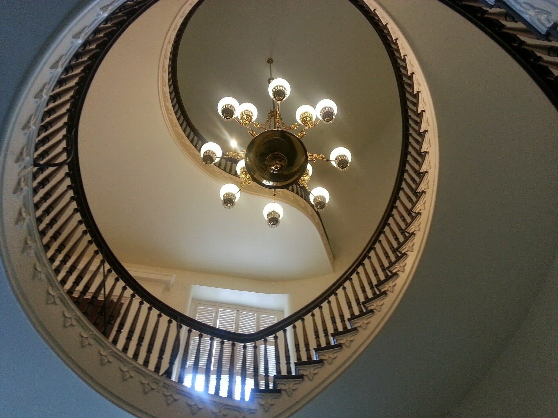Image of chandelier on stairs